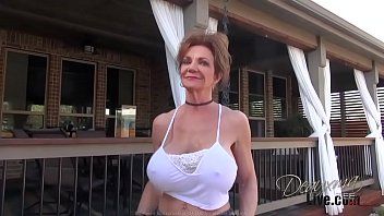play Xxx with mothers-in-law with big, silicone tits puts a vibrator in her ass